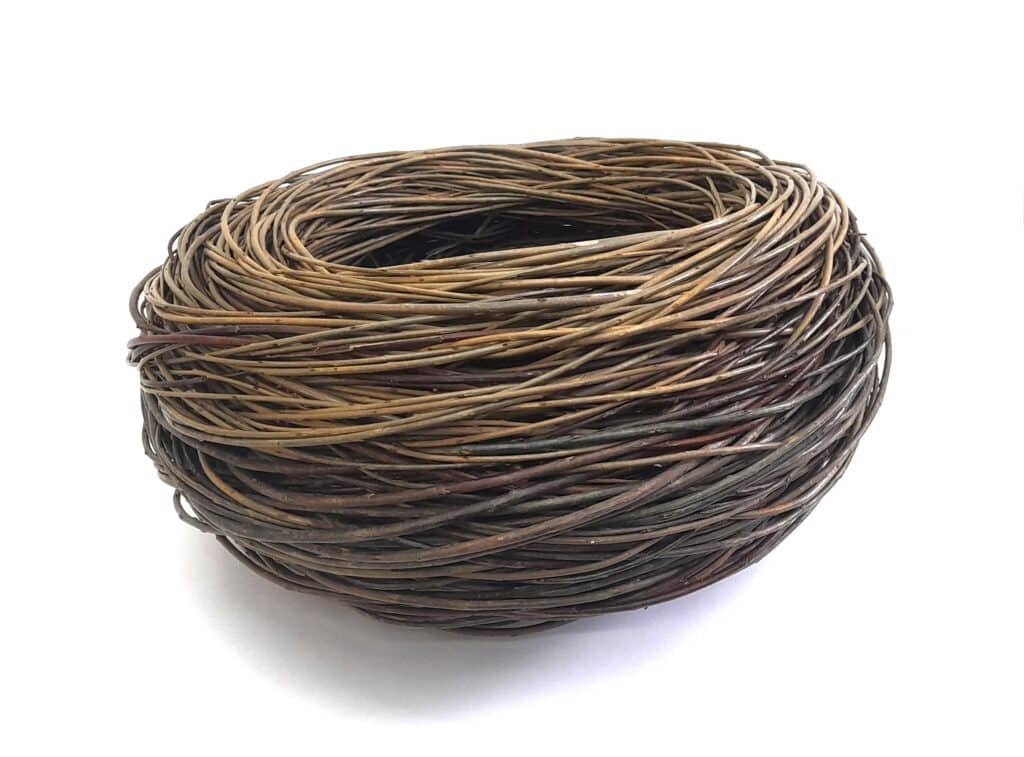 Large scale interlace basket in greens and blues
