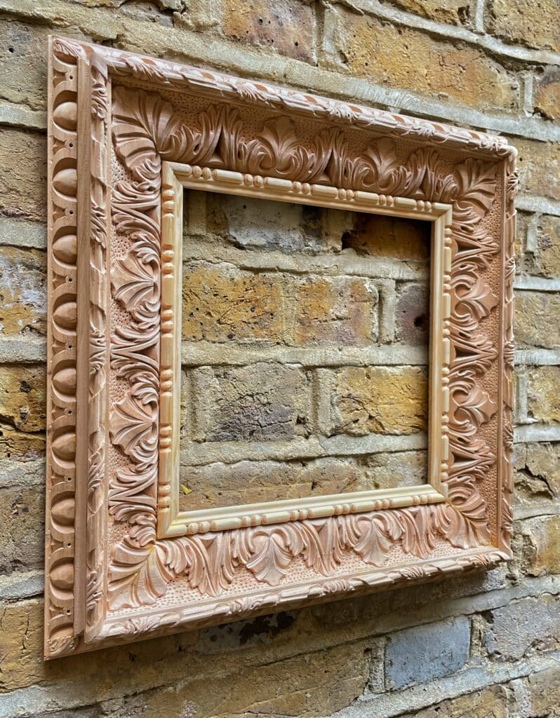 Carved mirror frame