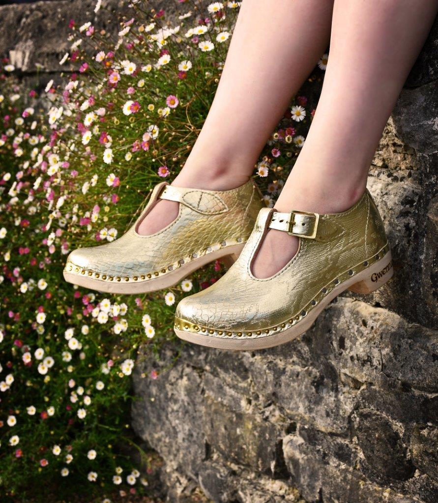 T-bar clogs in gold mock snakeskin for step dancing