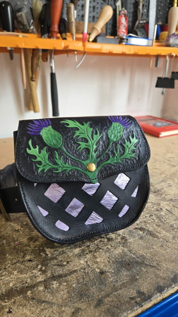 Hand tooled leather bag inspired by the traditional scottish sporran